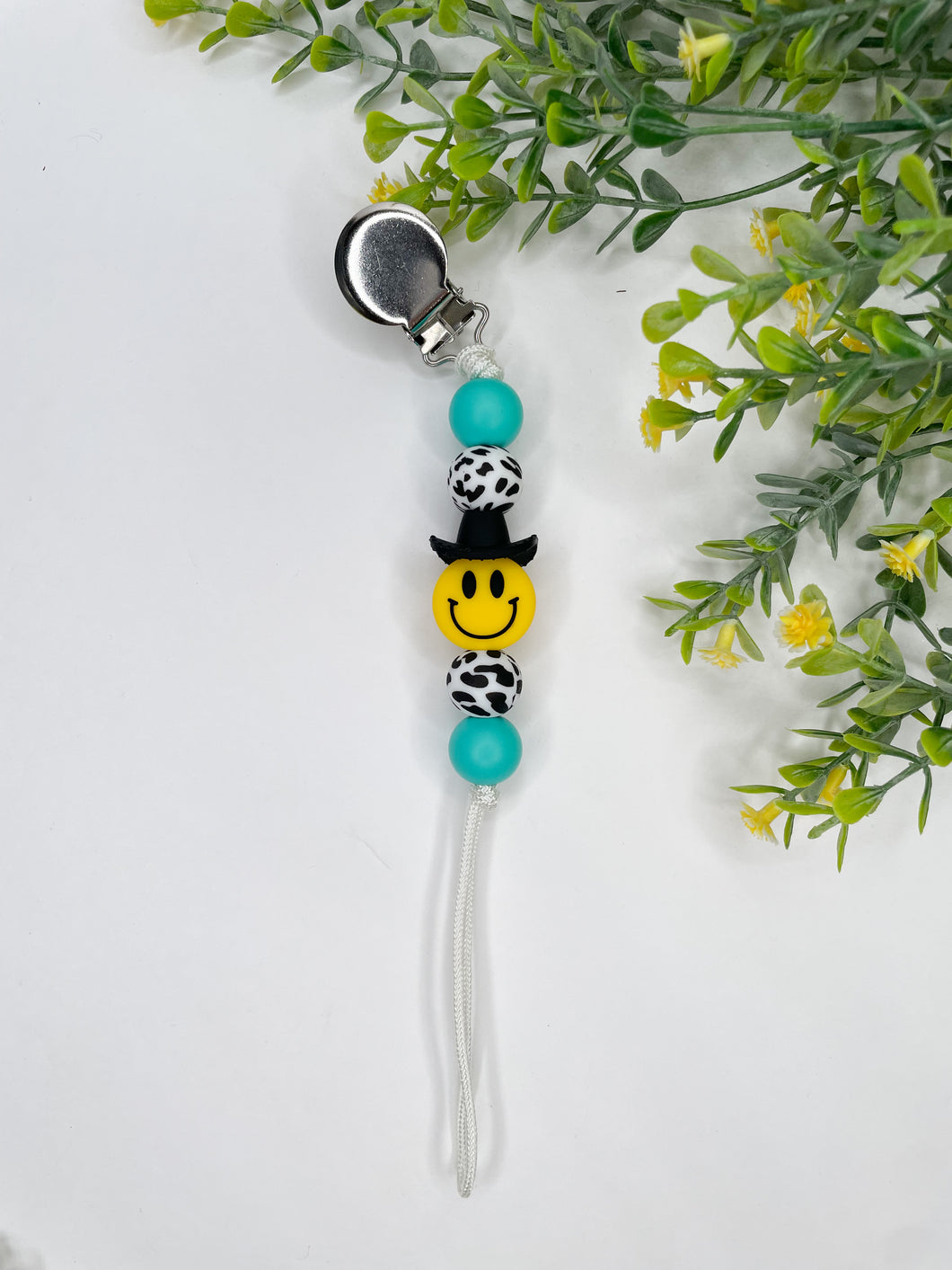 Turquoise Smiley Cowboy Paci Clip