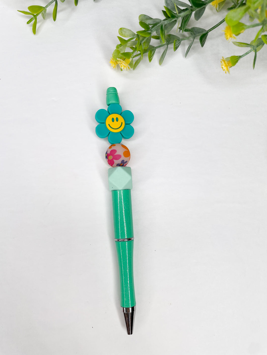 Turquoise daisy pen