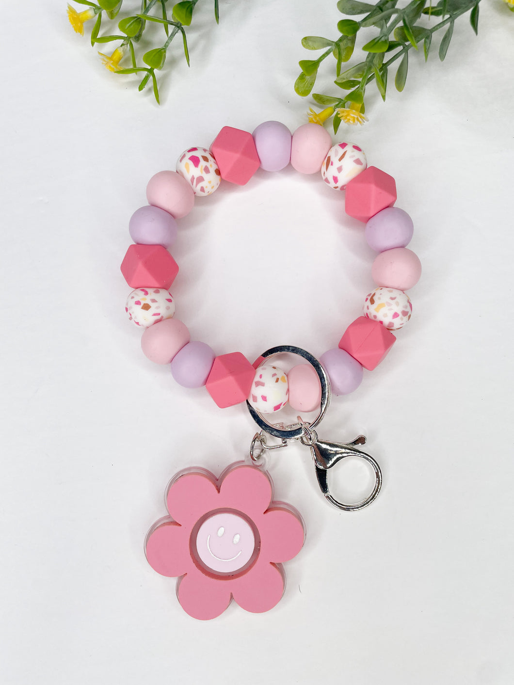 Pink terrazzo wristlet with daisy